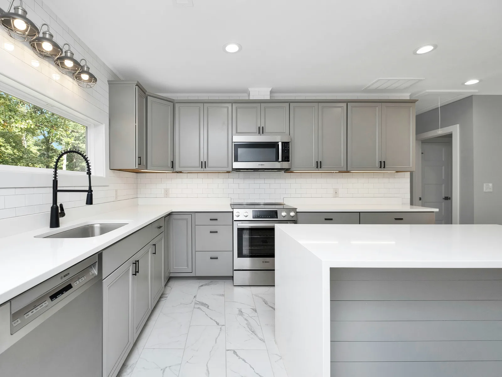 Kitchen finished to the Clean No More standard, counters clear and floors polished